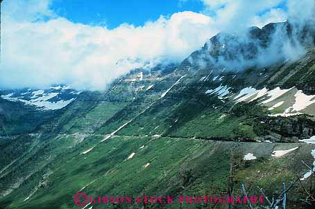 Stock Photo #12896: keywords -  cliff cliffs glacier going highway highways horz landscape landscapes logan montana mountain mountains national nature near park parks pass public road rocky route scenery scenic steep sun wilderness