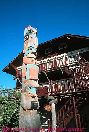 Stock Photo #12904: keywords -  craft crafted glacier lodge mcdonald montana mountain mountains national park parks pole poles public rocky statue statues totem vert