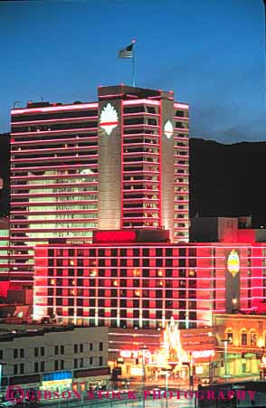 Stock Photo #10353: keywords -  bright building buildings casino casinos cities city cityscape cityscapes colorful lighting lights neon nevada night reno vert