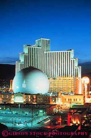 Stock Photo #10355: keywords -  architecture bright building buildings casino casinos cities city cityscape cityscapes colorful different distinctive dome lighting lights modern neon nevada new night reno round skyline skylines sphere spherical unique vert