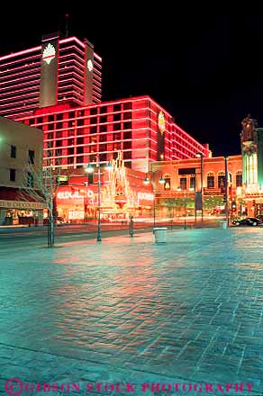 Stock Photo #17663: keywords -  bright business casino casinos center city dark district downtown evening lighting lights neon nevada night reno sign signs street streets vert virginia