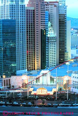 Stock Photo #7529: keywords - america american architecture building buildings business casino casinos center cities city cityscape cityscapes dark downtown dusk elevated evening hotel hotels las light lighting modern nevada new night office resort skyline skylines travel urban usa vacation vegas vert view york