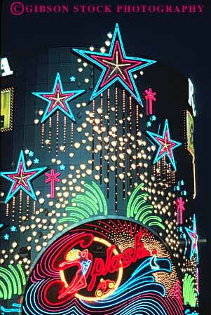 Stock Photo #8095: keywords - bright casino casinos color colorful dark destination dusk evening hotel hotels las lighting lights neon nevada night resort resorts riviera show sign splash travel usa vacation vegas vert