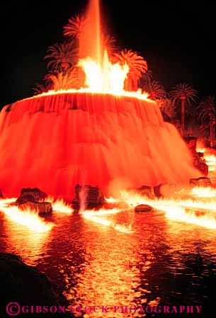 Stock Photo #8096: keywords - artificial bright casinos color colorful dark destination display dusk erupt erupting eruption evening exploding explore explosion fake flame fountain hotels las lighting lights mirage neon nevada night pretend realism realistic red resort resorts simulate simulated simulating travel usa vacation vegas vert volcanic volcano water