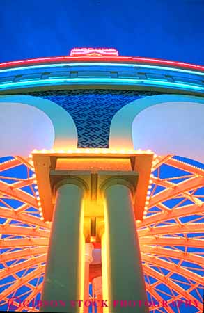 Stock Photo #8099: keywords -  architecture bright casino casinos color colorful dark destination detail dusk evening hotel hotels las lighting lights neon nevada night resort resorts sahara symmetrical travel usa vacation vegas vert