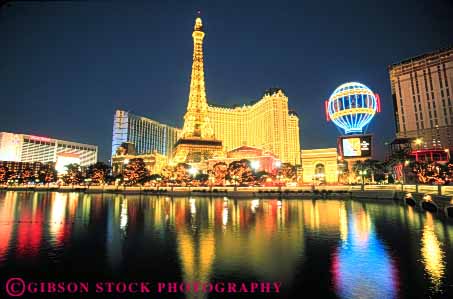 Stock Photo #8110: keywords - bright casino casinos color colorful dark destination dusk eiffel er evening horz hotel hotels las lighting lights neon nevada night paris resort resorts tall tow travel usa vacation vegas