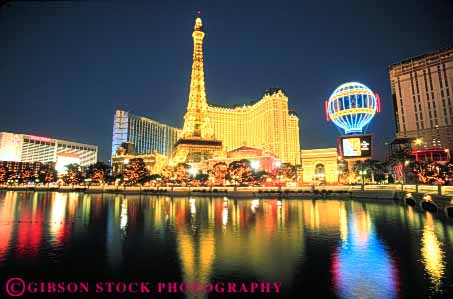 Stock Photo #8110: keywords -  bright casino casinos color colorful dark destination dusk eiffel er evening horz hotel hotels las lighting lights neon nevada night paris resort resorts tall tow travel usa vacation vegas