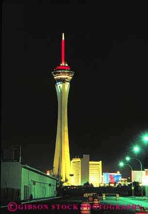 Stock Photo #8115: keywords -  architecture bright casino casinos color colorful dark destination dusk evening hotel hotels las lighting lights neon nevada night resort resorts stratosphere tall tower travel usa vacation vegas vert