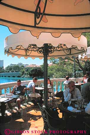 Stock Photo #8140: keywords -  bellagio business cafe casinos destination dining eat eating hotel hotels interior las nevada olives outdoor outside people relax relaxed relaxing resort resorts restaurant restaurants retail summer travel umbrella umbrellas usa vacation vegas vert