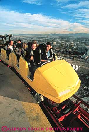 Stock Photo #8186: keywords -  activities activity casinos couple destination elevated fun game games high hotel hotels las nevada of people play recreation relax resort resorts ride rider riders riding rollercoaster stratosphere thrill top tourist tourists travel traveler travelers usa vacation vegas vert yellow