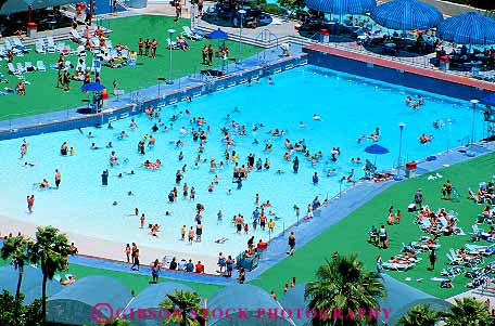 Stock Photo #12618: keywords - aerial blue cool crowd crowded elevate elevated horz las nevada overhead park parks people play playing pool recreation relax relaxing square swim swimming vegas view water waterpark waterparks wet wild