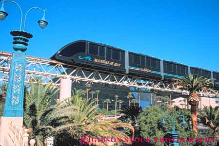 Stock Photo #8204: keywords - bay between casinos commute commuter commutes destination horz hotel hotels las light luxor mandaley monorail mover nevada people rail railroad resort resorts shuttle train tram transport transportation travel usa vacation vegas
