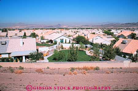 Stock Photo #8215: keywords -  array clean countless desert develop development home homes horz house houses landscape landscaped las lots many modern neighborhood neighborhoods nevada new residence residential rock rocks sprawl tract urban urbanization urbanized vegas