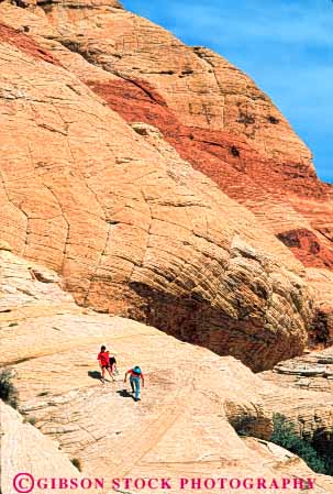 Stock Photo #8228: keywords -  area canyon conservation desert destination explore geologic geology hike hikers hiking landscape las national nature near nevada people recreation red redrock rock sandstone scenery scenic travel vegas vert walking