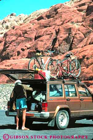 Stock Photo #8236: keywords -  area bicycle bicyclist biker canyon car conservation desert destination geologic geology landscape las national nature near nevada recreation red redrock rock sandstone scenery scenic travel vegas vert