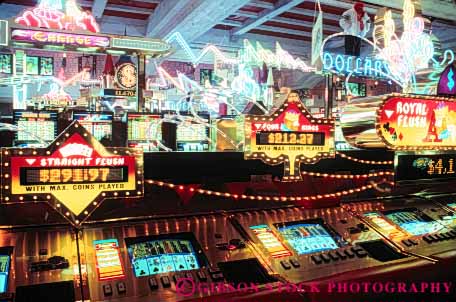 Stock Photo #8267: keywords -  area attraction casino casinos color colorful decor decorate decoration design destination excalibur gamble gambling gaming horz inside interior las lighting lights machine machines neon nevada row rows slot tourist travel usa vacation vegas