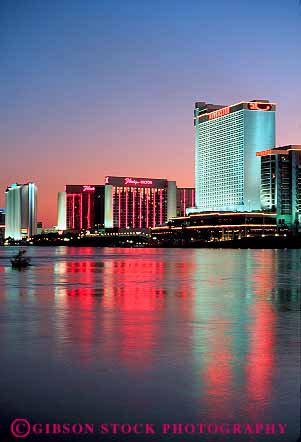 Stock Photo #12932: keywords -  bright building buildings casino casinos colorado dark destination dusk evening gamble gambling laughlin lighting lights neon nevada reflecting reflection reflects resort resorts river rivers sunset sunsets travel vert west