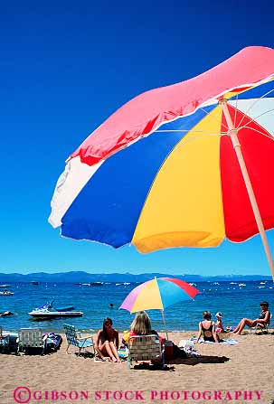 Stock Photo #12939: keywords - alpine beach beaches bright color colorful cove fresh lake lakes leisure mountain mountains nevada people relax relaxed relaxes relaxing resort resorts shade sierra sierras tahoe umbrella vacation vert water women zephyr
