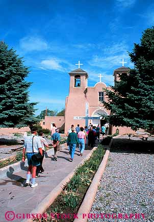 Stock Photo #12954: keywords -  adobe asis church churches de francis mexico mountains new people pueblo ranchos rocky st taos tourist tourists traveler travelers vert visitor visitors west western