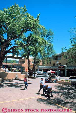 Stock Photo #12962: keywords -  downtown families family mexico mountains new park parks plaza public rocky summer taos town towns vert walk walker walking walks west western