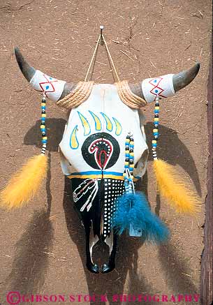 Stock Photo #12971: keywords -  art artistic cattle decorate decorated decorates design display head mexico mountains new rocky skeleton skeletons skull skulls style taos vert west western