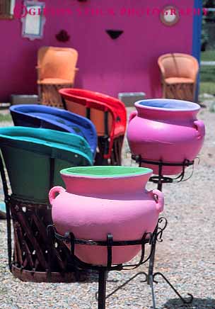 Stock Photo #12972: keywords -  and art bowl bowls bright chairs clay color colorful craft crafts display displaying displays merchandise mexico mountains new pot pots pottery retail rocky sell selling sells taos vert west western