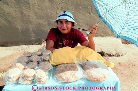 Stock Photo #12973: keywords -  american baked bread bun buns business ethnic food goods horz indian mexico minority mountains native new pueblo pueblos retail rocky roll rolls sell selling sells small taos west western woman women