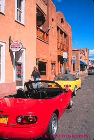 Stock Photo #8950: keywords -  and car cars destination fe mexico mountain mountains new park parked parking rocky sante shops southwest store stores street travel vert west western