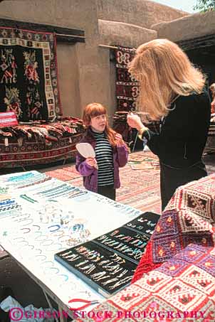 Stock Photo #8955: keywords -  child daughter destination fe female girl jewelry mexico mother mountain mountains new outdoor outside parent rocky sante shop shopper shoppers shopping single southwest travel vert west western woman women