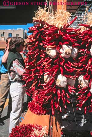 Stock Photo #8956: keywords -  chili chilis destination display dry drying fe hang hanging mexico mountain mountains new pepper peppers produce red rocky sante southwest travel vert west western