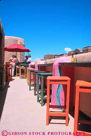 Stock Photo #8960: keywords -  balconies balcony cafe cafes cantina cantinas coyote destination fe mexico mountain mountains new outdoor outside people restaurant restaurants rocky sante southwest summer travel vert west western