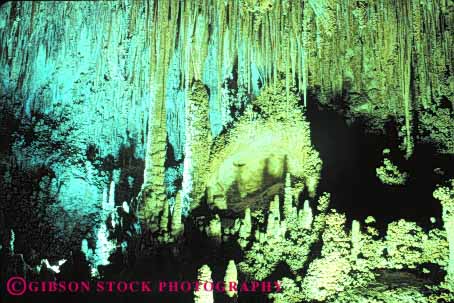 Stock Photo #9912: keywords - calcium carbonate carlsbad cave cavern caverns caves dark deposit depositing deposition deposits dissolution dissolve dissolved dissolving dripstone earth erode eroded erodes eroding erosion flowstone formation formations geologic geological geology ground hollow hollowed horz lighting limestone mexico national new park parks rock science sedimentary stalactite stalactites stalagmite stalagmites