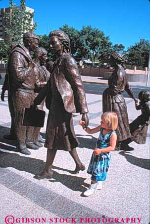 Stock Photo #11101: keywords - albuquerque cities city girl hand holds metal mexico new of people plaza realistic southwest statue statues urban vert west