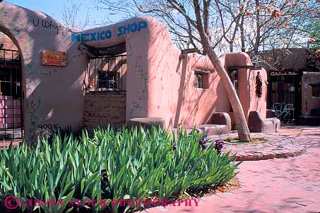 Stock Photo #11135: keywords -  adobe albuquerque architecture design growing horz irises mexico near new old pueblo southwest style town urban west