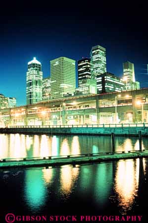 Stock Photo #7548: keywords - america american architecture bright building buildings business center cities city cityscape cityscapes downtown lighting lights modern new night office seattle skyline skylines urban usa vert washington waterfront west