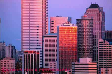 Stock Photo #10292: keywords -  alpenglow architecture building buildings cities city cityscape cityscapes commercial dark design downtown dusk evening horz northwest office offices orange reflect reflecting reflection reflects seattle skyline skylines style sunset sunsets urban warm washington window windows