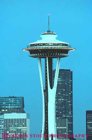Stock Photo #10294: keywords -  architecture building circle circular cities city commercial dark design distinctive dusk engineered engineering evening landmark landmarks leg legs lighting lights modern needle night northwest office offices oval round seattle space style support supports tall unique urban vert washington