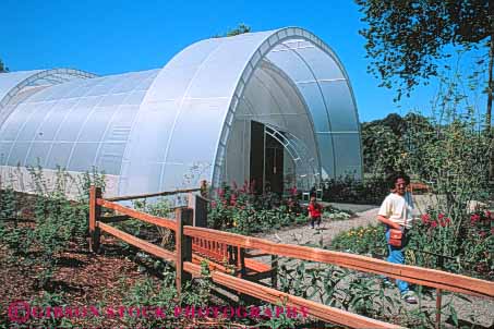 Stock Photo #10303: keywords -  attraction butterfly cities city contain containment dome enclose enclosed enclosure greenhouse greenhouses horz material northwest park people plastic seattle synthetic tourist translucent transparent tube washington woodland zoo