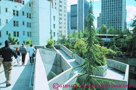 Stock Photo #10306: keywords -  artificial attraction cement cities city concrete freeway hemlock horz in manmade municipal northwest park parks past pedestrian pedestrians people public seattle tourist tree trees walk walkers walking wall walls washington