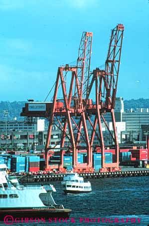 Stock Photo #10310: keywords - business commerce container containers crane cranes equipment industrial industry ocean of port sea seattle ship shipping ships transfer transferring transfers transport transportation vert washington waterfront