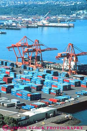 Stock Photo #10311: keywords -  business commerce container containers crane cranes equipment industrial industry ocean of port sea seattle ship shipping ships transfer transferring transfers transport transportation vert washington waterfront