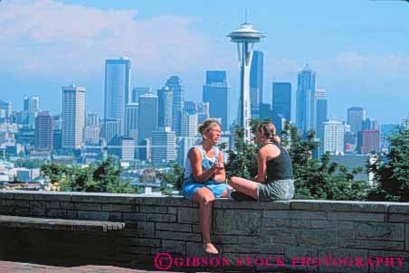 Stock Photo #10316: keywords -  chat chats chatting cities city cityscape cityscapes friend friends horz intimacy intimate kerry northwest outside pair park people seattle share sharing social summer talk talking talks two washington women