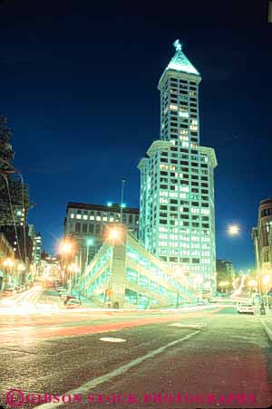 Stock Photo #10331: keywords -  acrhitecture building design downtown historic history illuminate illuminated lighting lights night northwest office old older pioneer seattle smith square style tall tower urban vert washington