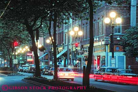 Stock Photo #10333: keywords - dark downtown dusk evening historic history horz lighting lights northwest pioneer plaza plazas seattle square street streets traffic urban washington