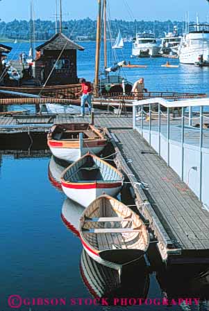 Stock Photo #10335: keywords -  boat boating boats center club clubs dock docks heritage marina marinas marine maritime northwest seattle vert washington wood wooden