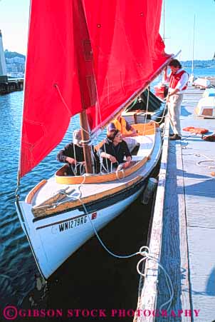 Stock Photo #10338: keywords -  adult boat boating boats center class classes club clubs dock docks heritage marina marinas marine maritime northwest recreation red sail sailboat sailboats sailing sails seattle vert washington wood wooden