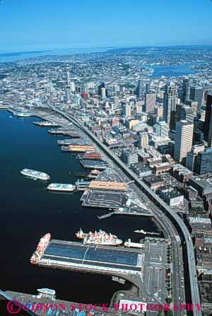 Stock Photo #10345: keywords -  aerial aerials area cities city cityscape cityscapes downward elevated metropolitan northwest port puget seattle sound urban urbanization urbanized vert view washington waterfront wharf wharfs