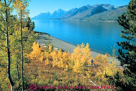 Stock Photo #12044: keywords -  aspen autumn daughter fall grand horz jackson lake lakes landscape landscapes mother mountain mountains national park parks released rocky scenery scenic season teton water west western wyoming