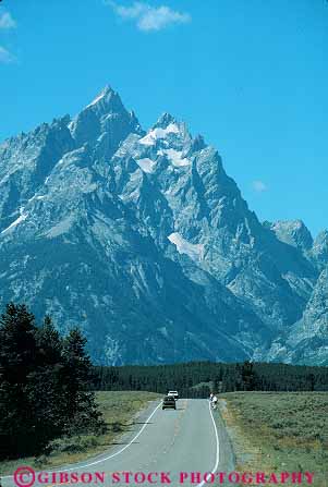 Stock Photo #12998: keywords - alpine car environment grand habitat highway highways landscape mountain mountains national natural nature outdoor outside park parks peak peaks people public road roads rocky route scenery scenic street teton tetons traffic vert west western wyoming