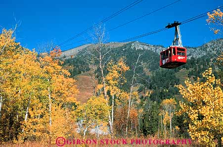 Stock Photo #13013: keywords -  alpine autumn cab cable carry carrying carrys color destination fall foliage gondola gondolas hole horz jackson lift lifting lifts mountain mountains outdoor outside ride rocky scenic summer teton tetons tourist town towns tram trams travel village west western wyoming